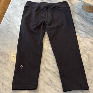 Like new. Iviva cropped Black Leggings with Logo